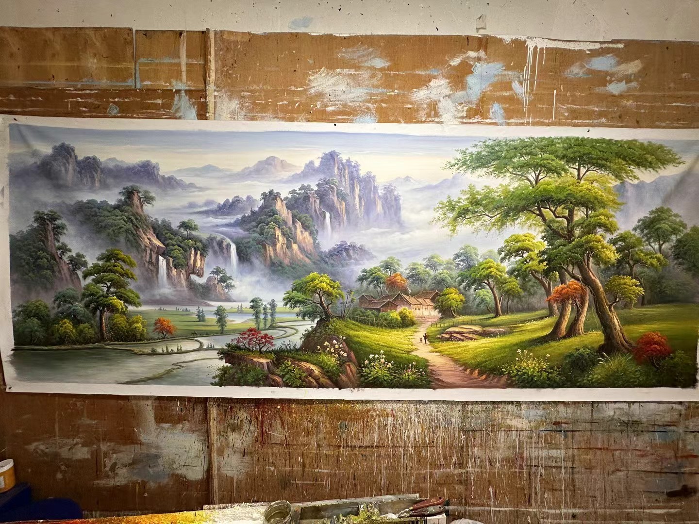 老廖手绘《山居田园瀑布》油画，嫩草绿翠色淡紫灰雾调，山居民居曲河田畴奇峰飞瀑，适合客厅茶室挂画